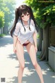 A woman in a white shirt and red panties walking down a street.