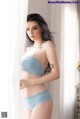 Beautiful Jessie Vard seductive with blue lingerie (13 photos)